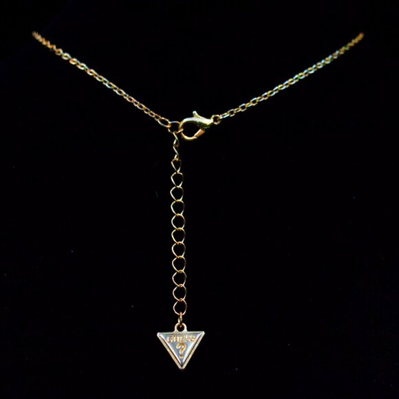 GUESS GLASS CRYSTAL RHINESTONE LINED GOLD TONE STAR NECKLACE - JNCSSL1 - Picture 3 of 4